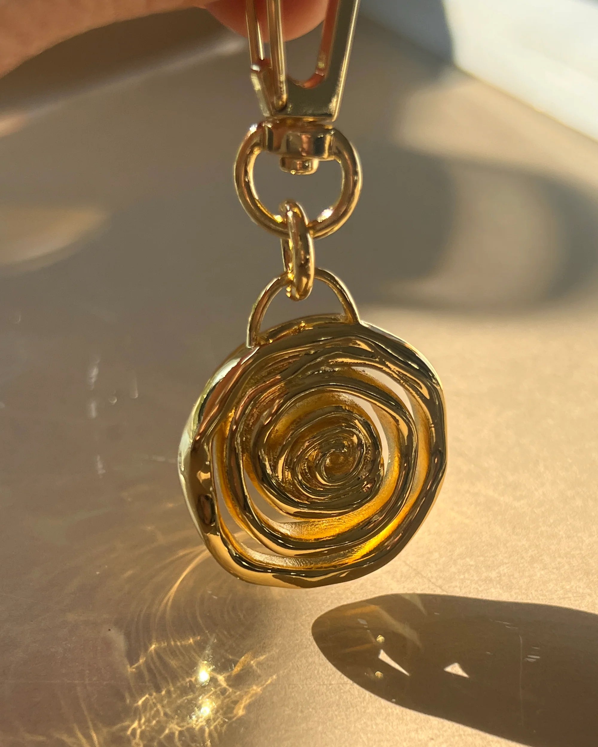 Rosette coil key chain - gold