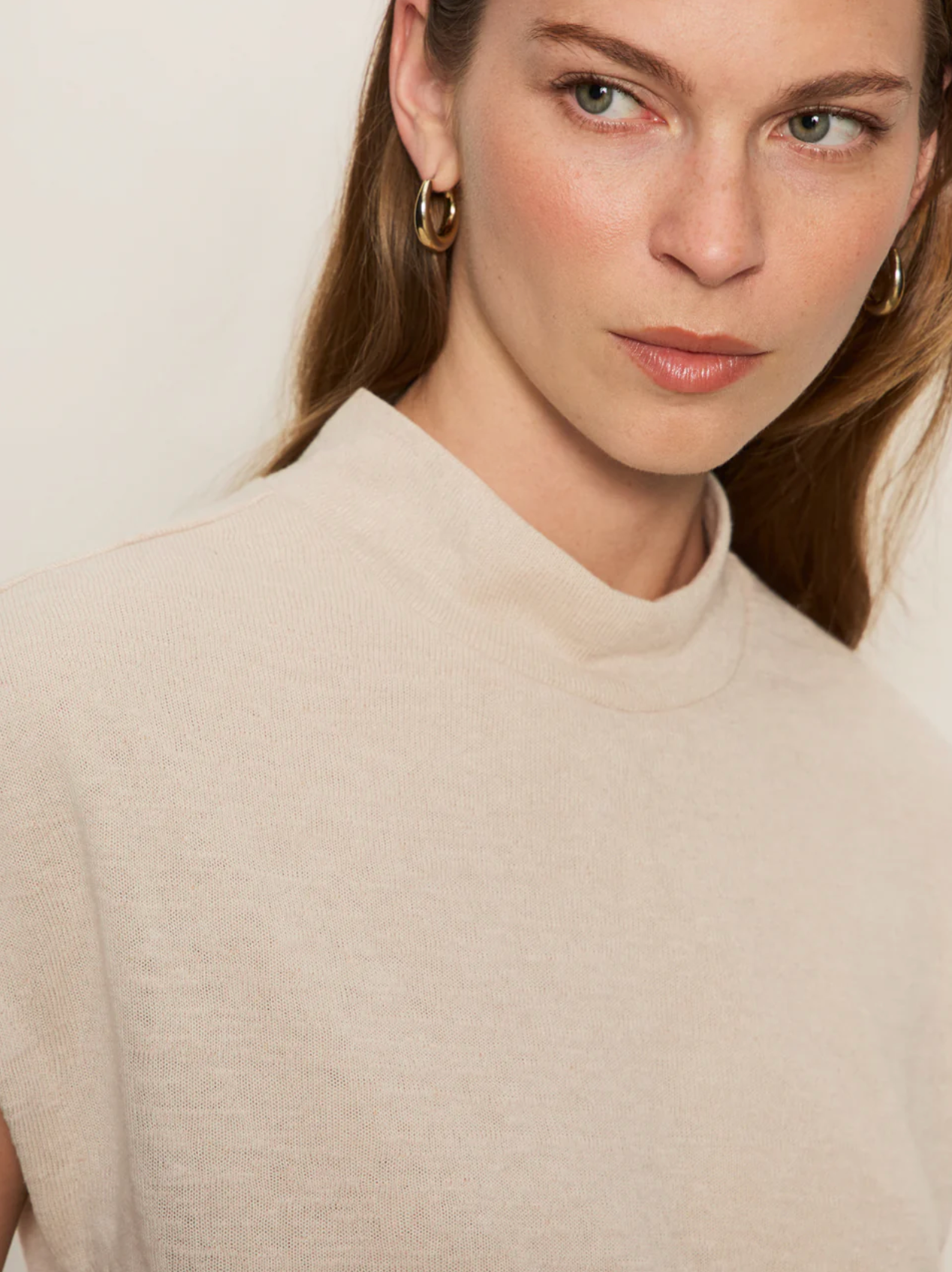 Draped sleeveless mock neck - mother of pearl